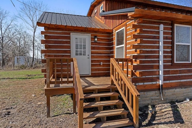 doorway to property with a wooden deck