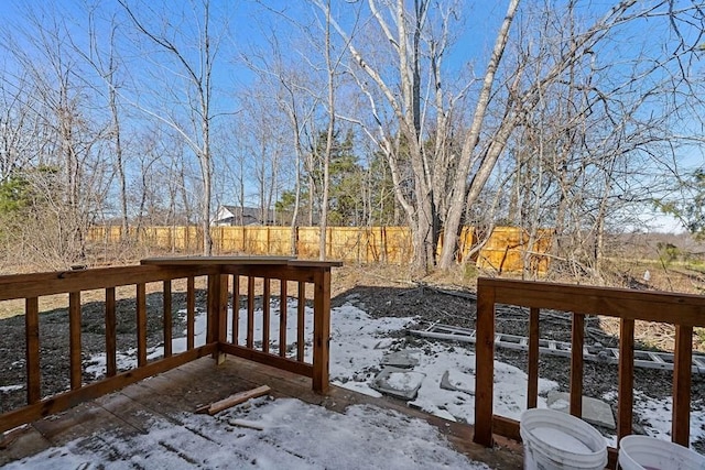 view of snow covered deck