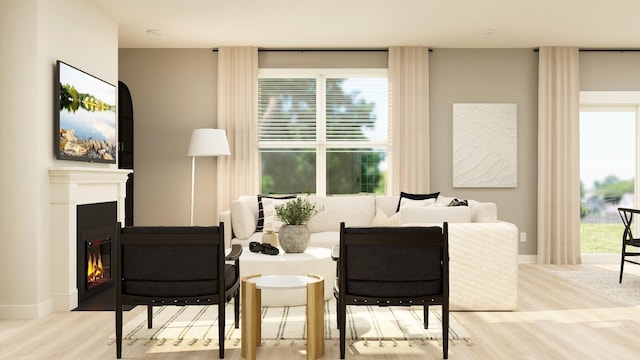 sitting room with light hardwood / wood-style floors