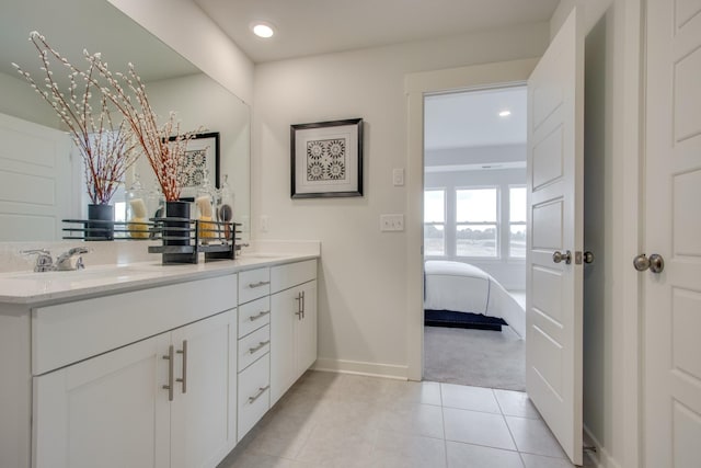 bathroom featuring vanity and tile patterned flooring