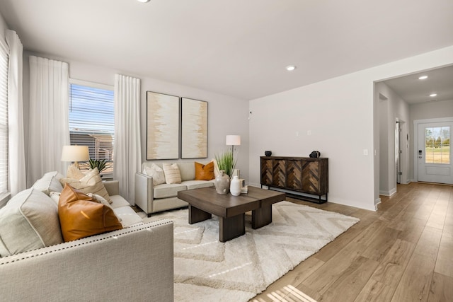 living room with light hardwood / wood-style floors