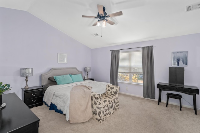 carpeted bedroom featuring vaulted ceiling and ceiling fan