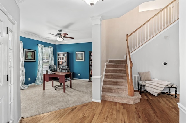 office featuring crown molding, hardwood / wood-style flooring, decorative columns, and ceiling fan