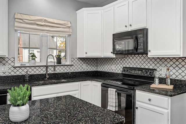 kitchen featuring sink, white cabinetry, tasteful backsplash, dark stone countertops, and black appliances