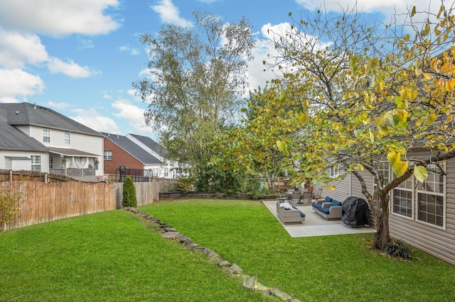 view of yard with a patio and outdoor lounge area