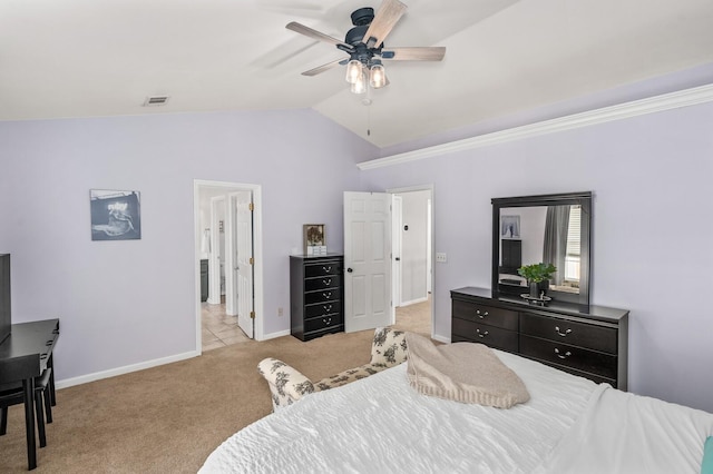 bedroom featuring lofted ceiling, light colored carpet, and ceiling fan