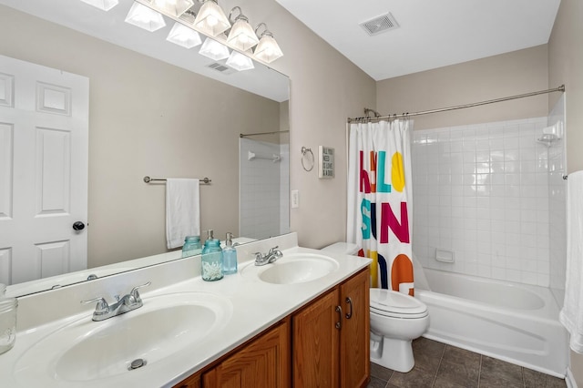 full bathroom with vanity, toilet, and shower / bath combo with shower curtain