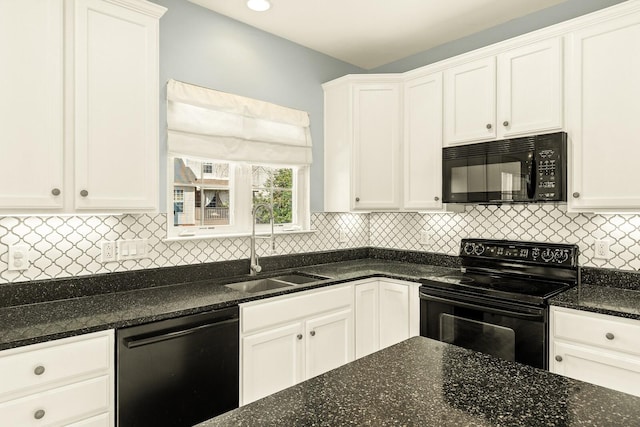 kitchen featuring black appliances, a sink, and white cabinetry