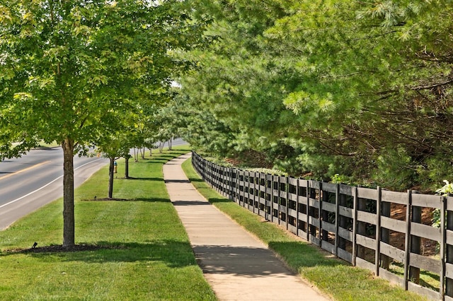 view of community featuring a yard