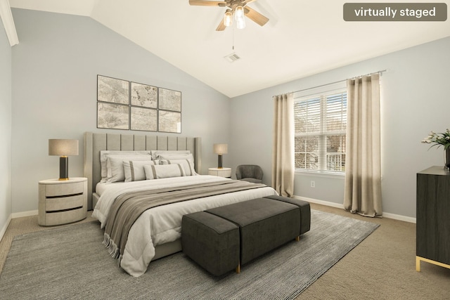 bedroom with carpet flooring, a ceiling fan, visible vents, vaulted ceiling, and baseboards