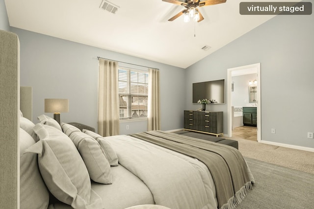 bedroom with light colored carpet, visible vents, lofted ceiling, and baseboards