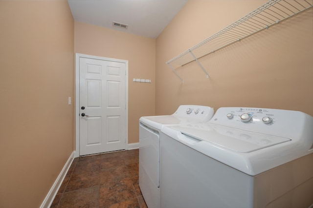 washroom featuring independent washer and dryer