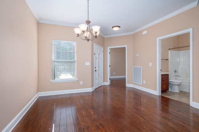 unfurnished room featuring a notable chandelier, crown molding, and dark hardwood / wood-style flooring