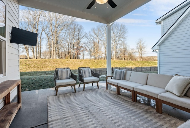 view of patio featuring outdoor lounge area and ceiling fan