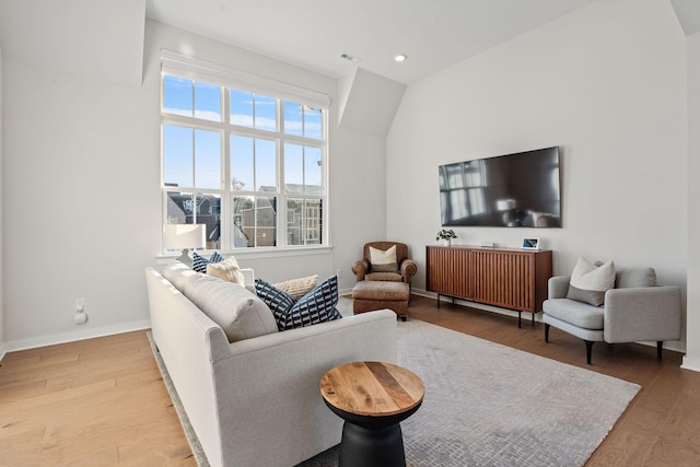 living room featuring hardwood / wood-style flooring and plenty of natural light