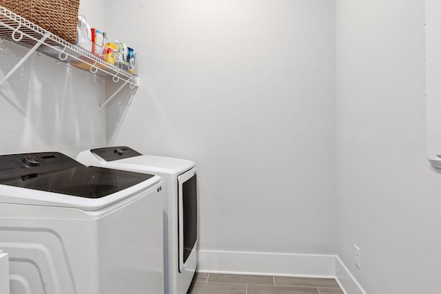 washroom with separate washer and dryer