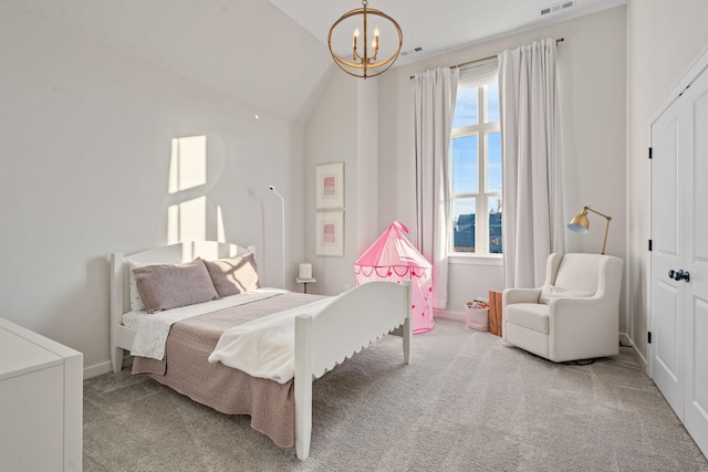 bedroom featuring lofted ceiling, light carpet, and a chandelier