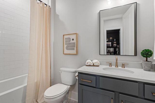 full bathroom featuring vanity, toilet, and shower / bath combination with curtain