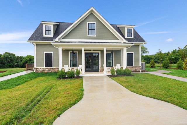 view of front of home featuring a porch and a front lawn