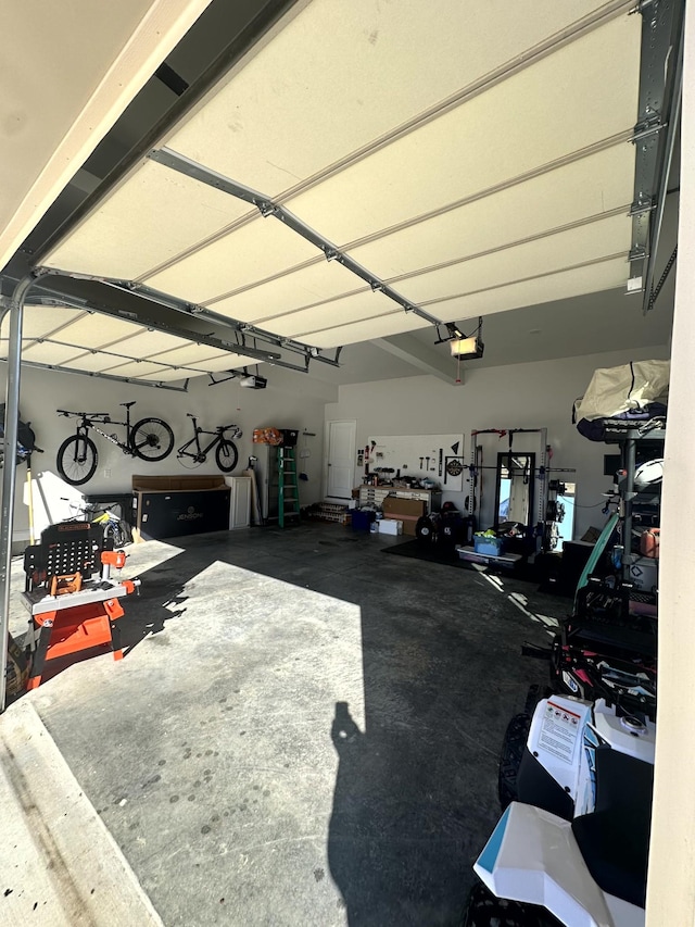 garage featuring a garage door opener