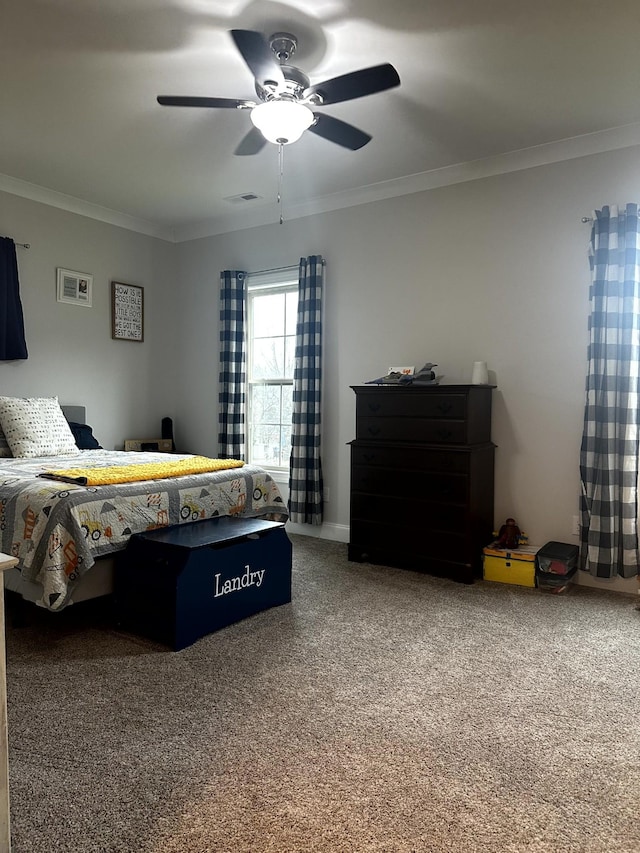 bedroom with carpet, ceiling fan, and ornamental molding