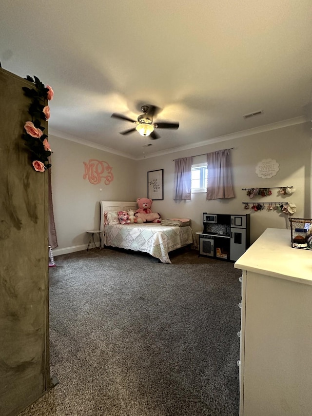 unfurnished bedroom with ceiling fan, dark carpet, and ornamental molding