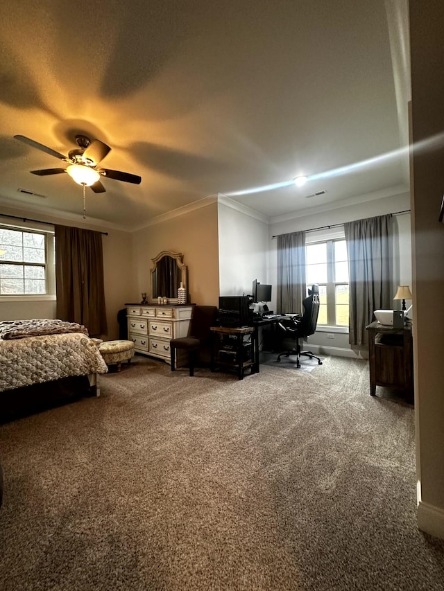 bedroom with ceiling fan, carpet, ornamental molding, and multiple windows