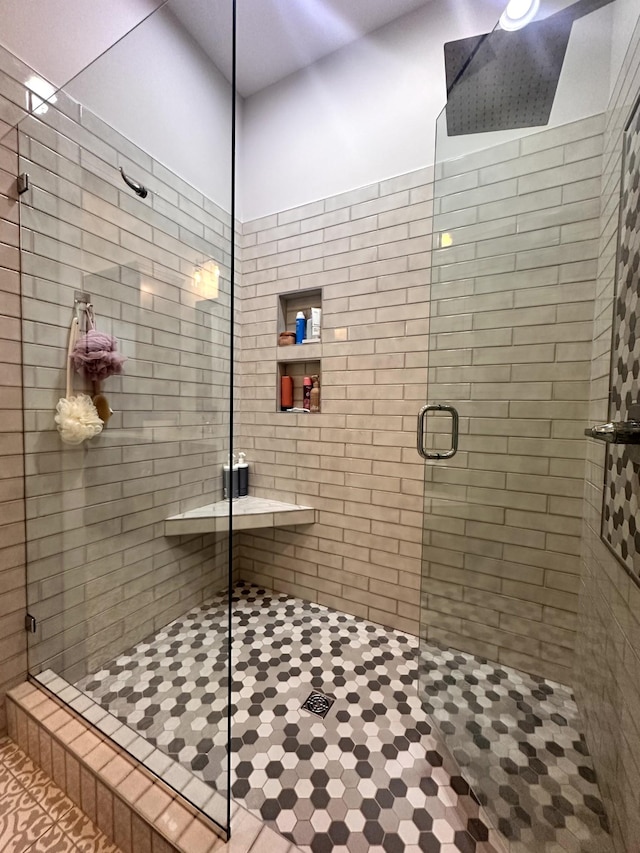 bathroom featuring an enclosed shower