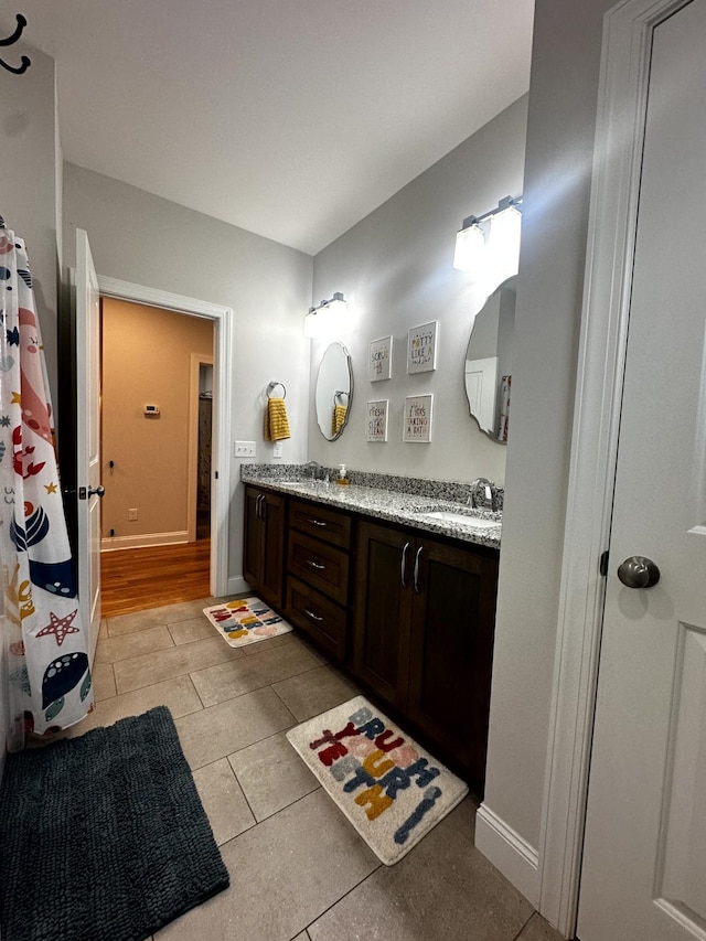 bathroom featuring vanity and tile patterned floors