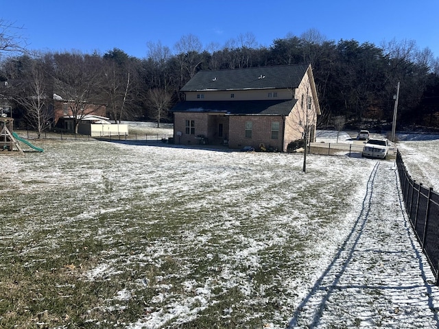 view of yard covered in snow