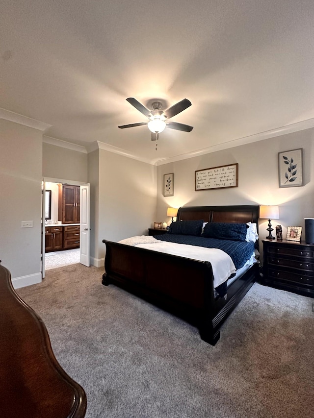 bedroom with crown molding, light carpet, connected bathroom, and ceiling fan