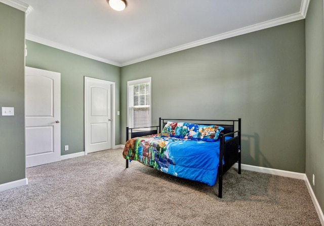 bedroom featuring crown molding and carpet flooring