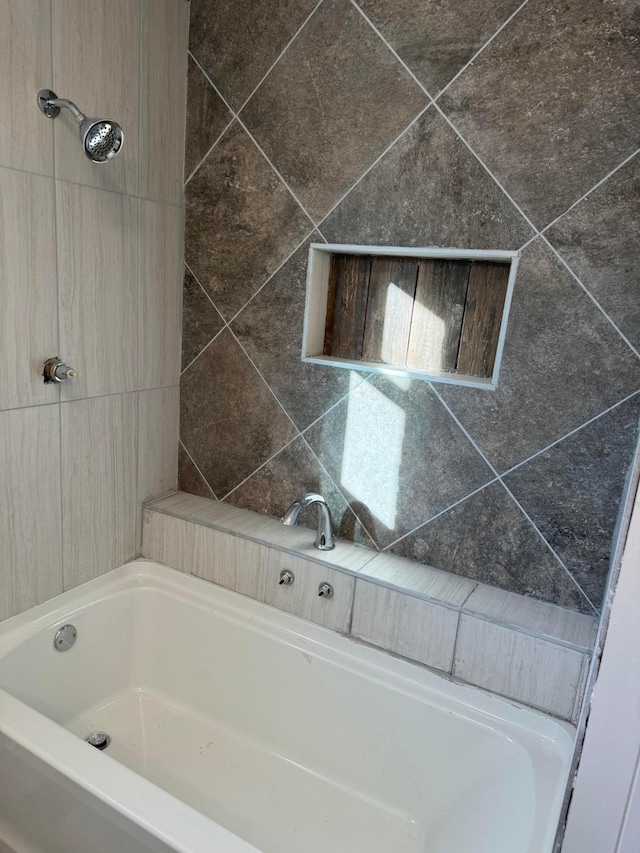 bathroom with shower / tub combination