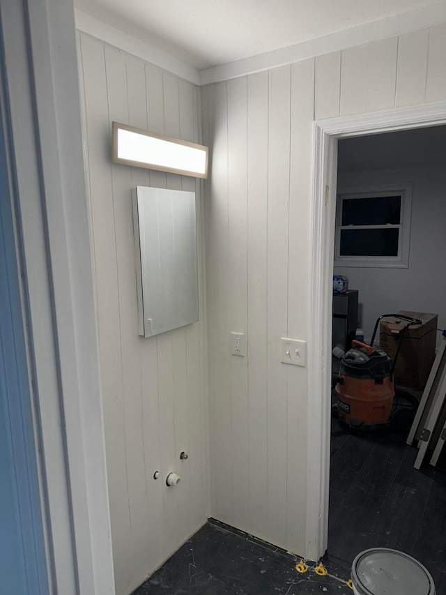 bathroom with wooden walls