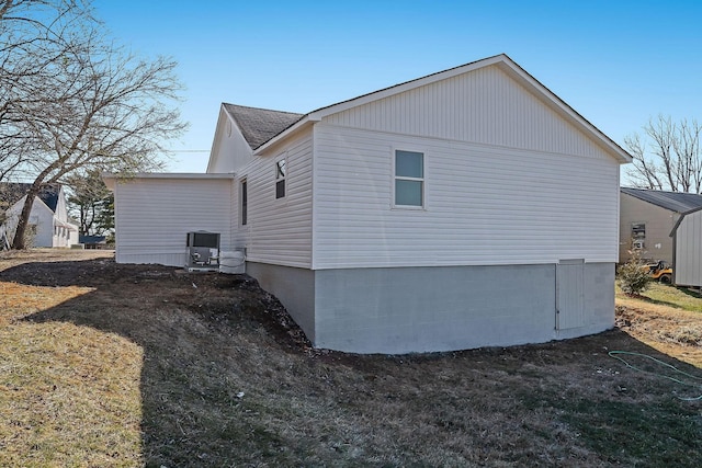 view of home's exterior featuring central AC