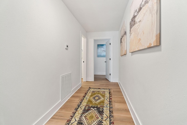 hall featuring hardwood / wood-style flooring