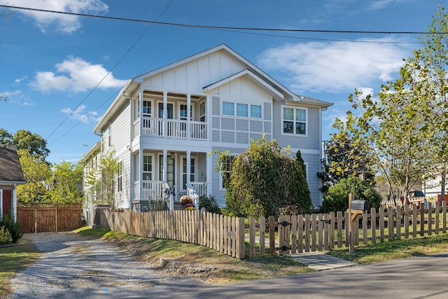 view of front of house featuring a balcony and a porch