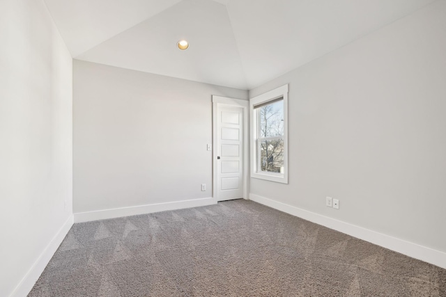 unfurnished room with recessed lighting, carpet flooring, lofted ceiling, and baseboards