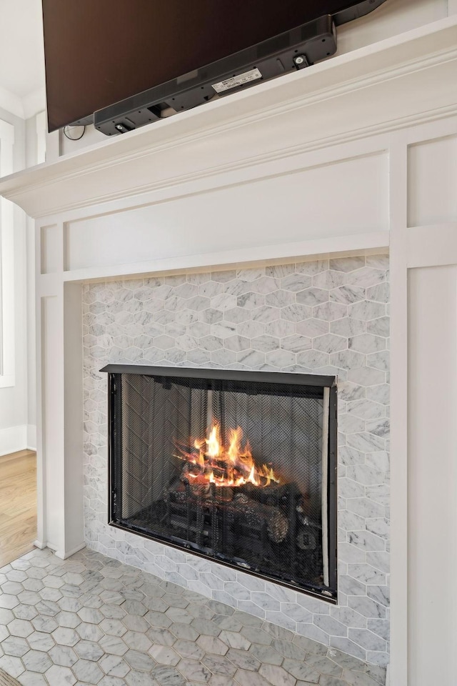 interior details with a fireplace