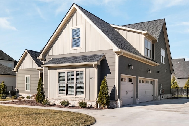 view of side of property featuring a garage