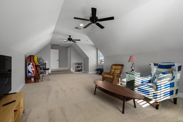 living area with carpet flooring and vaulted ceiling