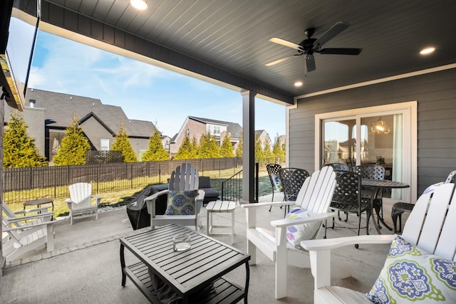 view of patio featuring ceiling fan and outdoor lounge area