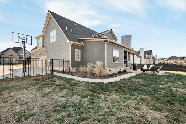 view of home's exterior featuring a lawn and a patio