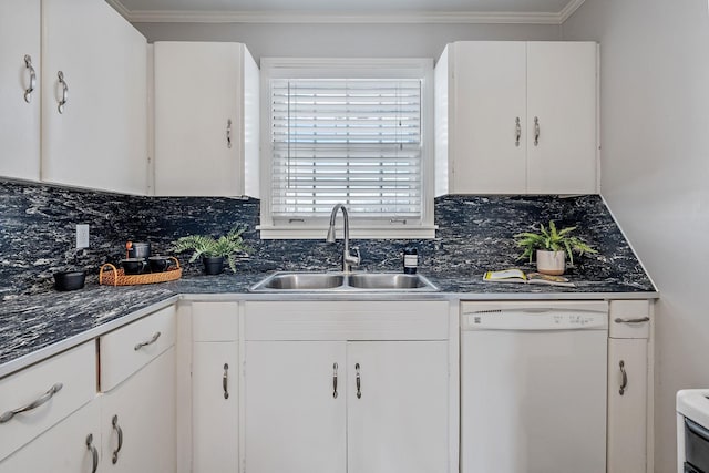 kitchen featuring sink, white cabinets, decorative backsplash, and dishwasher