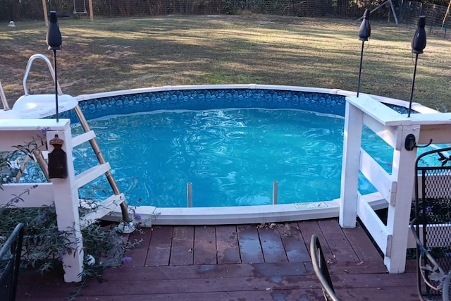 view of pool featuring a deck