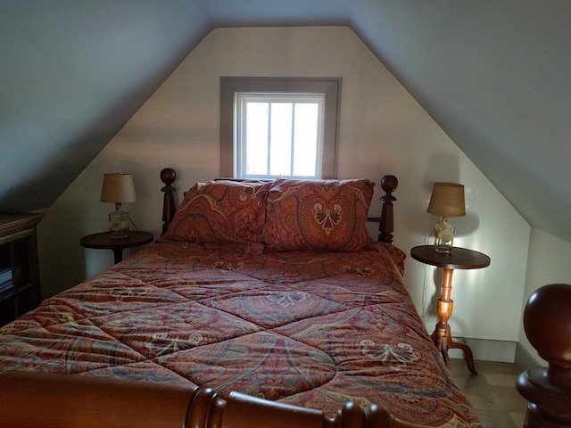 bedroom with vaulted ceiling