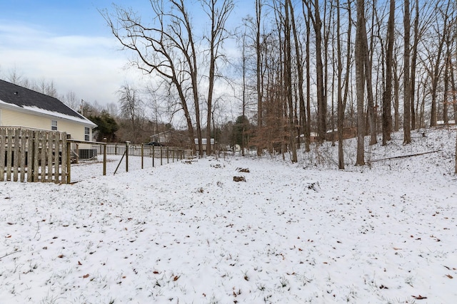 view of yard layered in snow