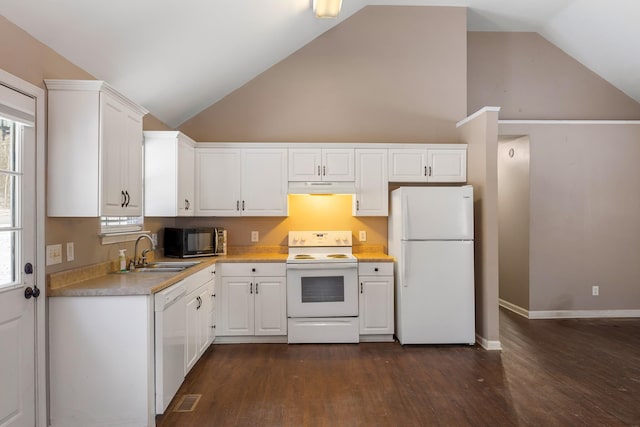 kitchen featuring white appliances, lofted ceiling, dark wood-type flooring, white cabinetry, and sink