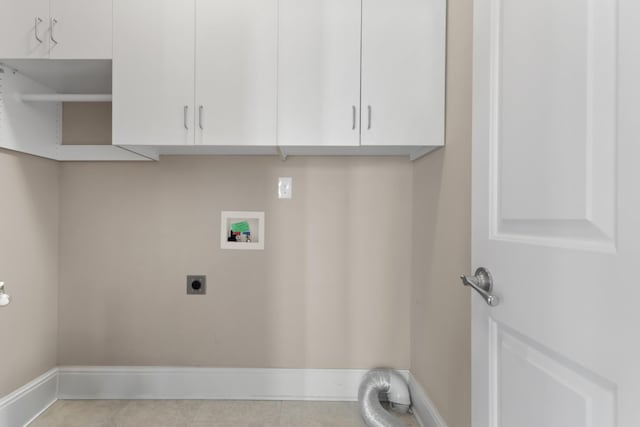 clothes washing area featuring cabinets, washer hookup, and electric dryer hookup