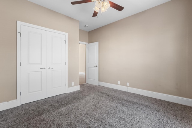 unfurnished bedroom with carpet floors, a closet, and ceiling fan